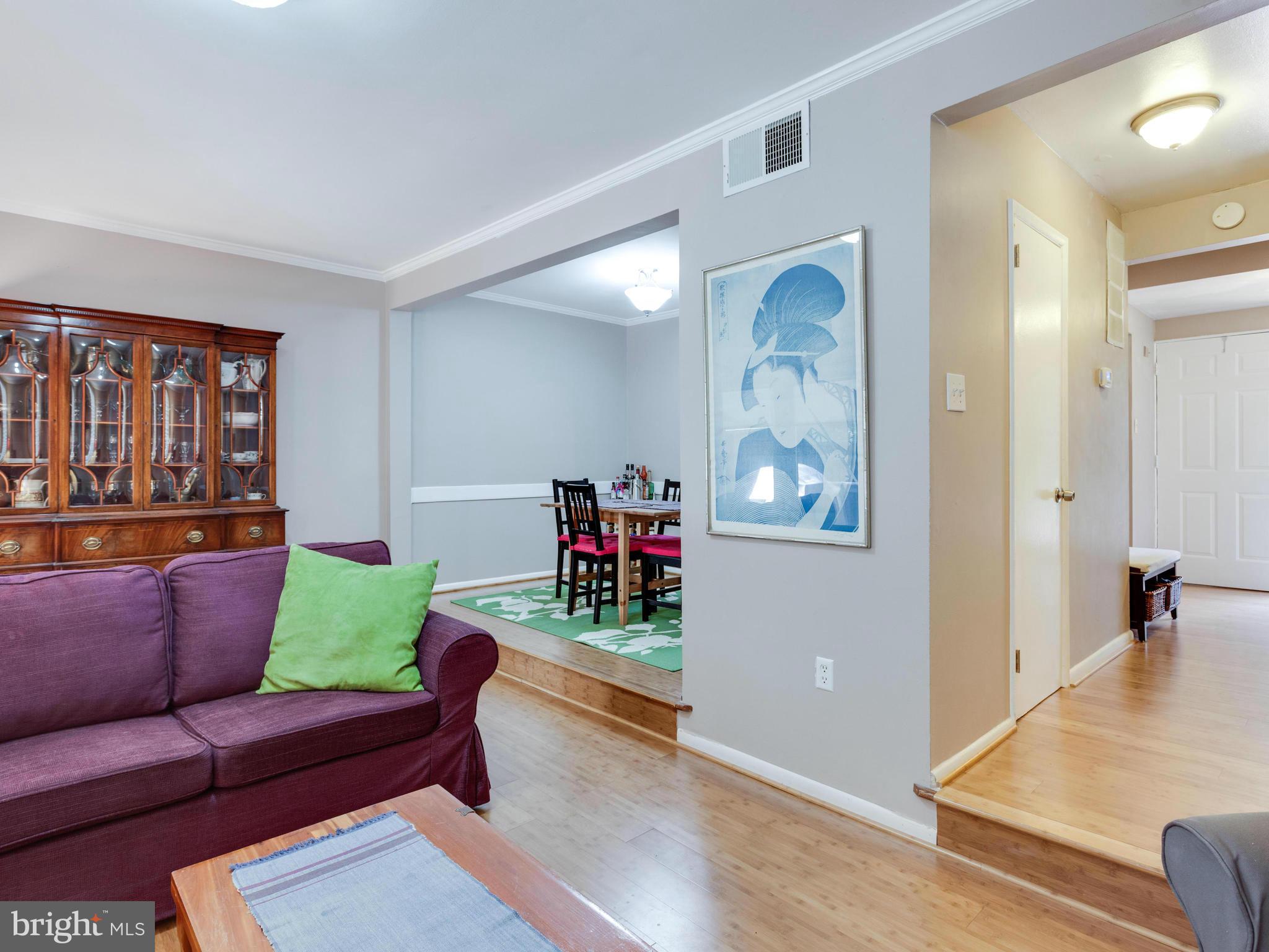 2334 Antiqua Court Reston, VA 20191 - Photo 11 of 30 a living room with furniture and wooden floor