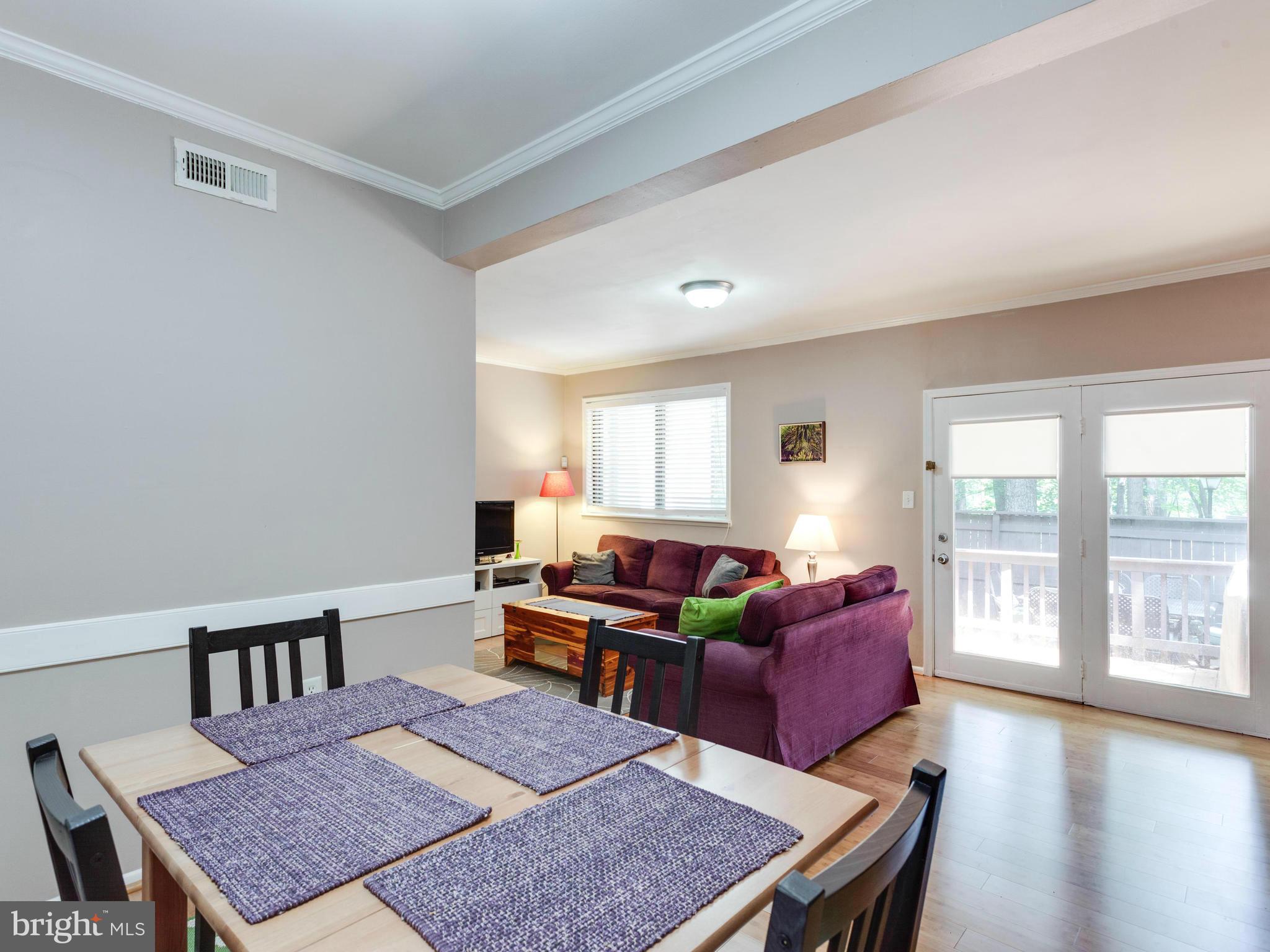 2334 Antiqua Court Reston, VA 20191 - Photo 14 of 30 a living room with furniture and a wooden floor