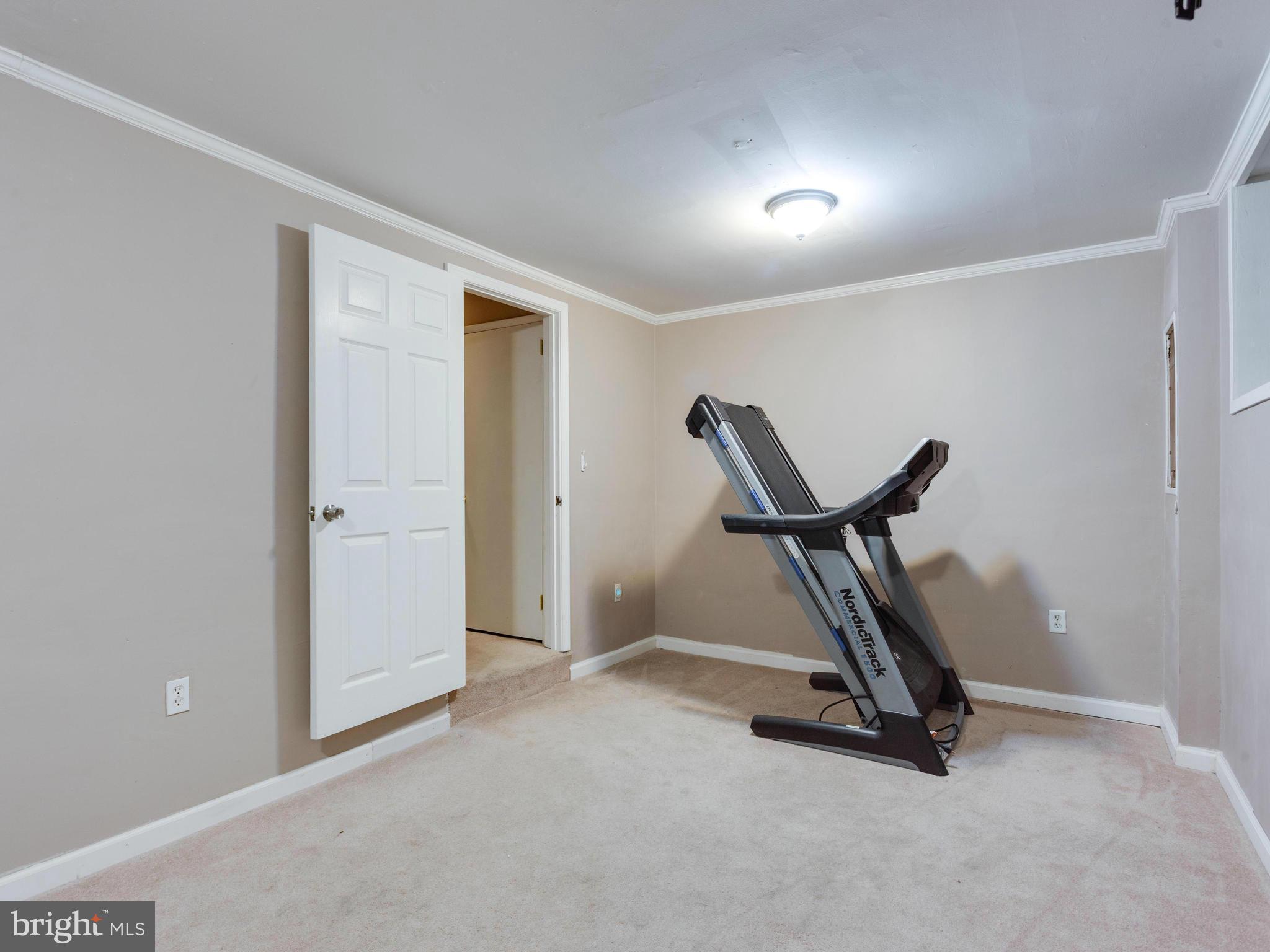 2334 Antiqua Court Reston, VA 20191 - Photo 17 of 30 a view of a room with gym equipment