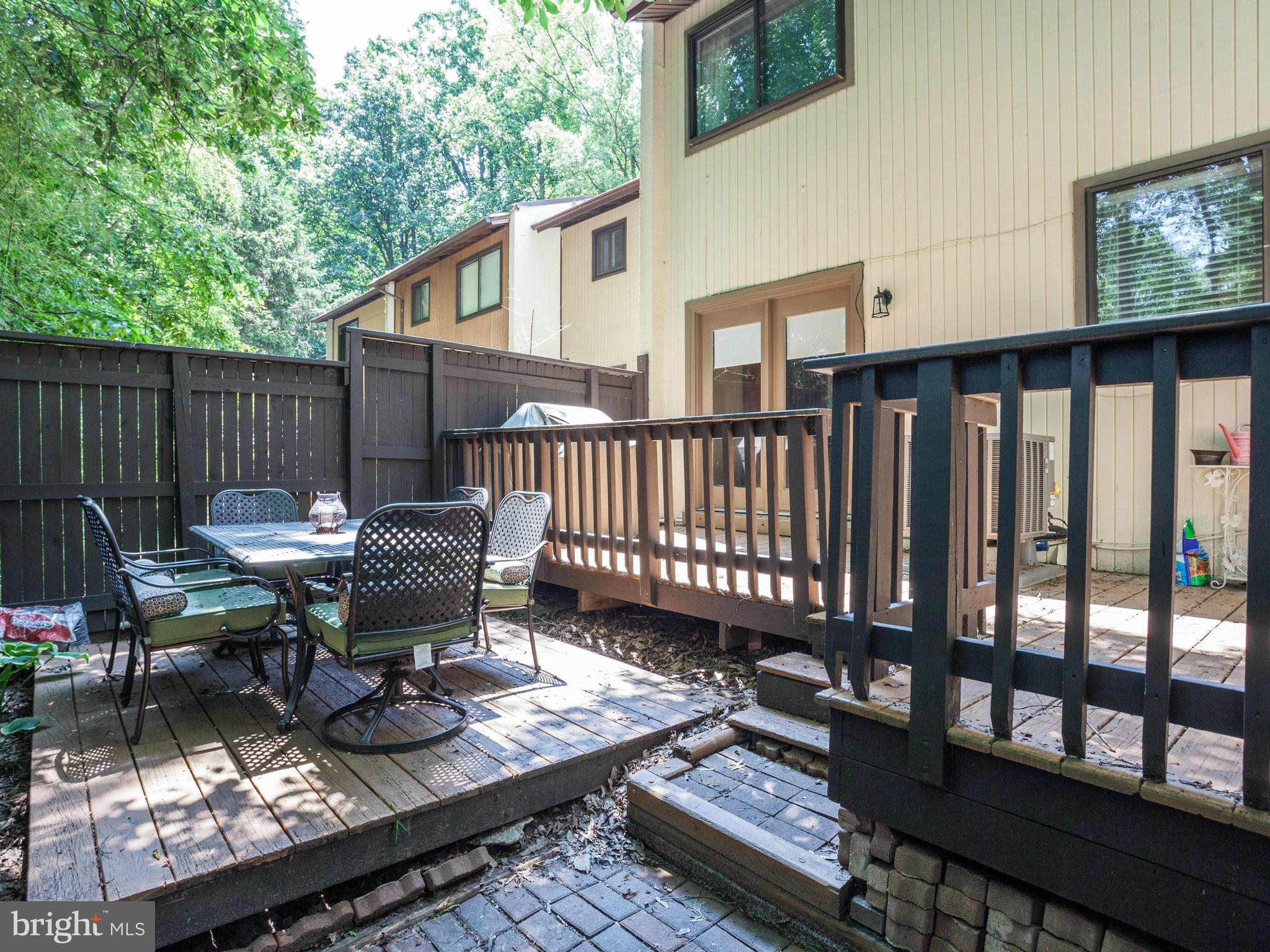2334 Antiqua Court Reston, VA 20191 - Photo 26 of 30 a view of a roof deck with wooden floor and outdoor seating