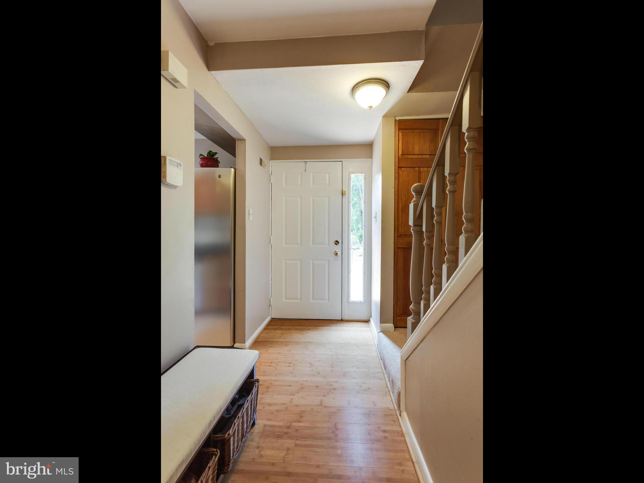 2334 Antiqua Court Reston, VA 20191 - Photo 4 of 30 a view of a hallway with a room