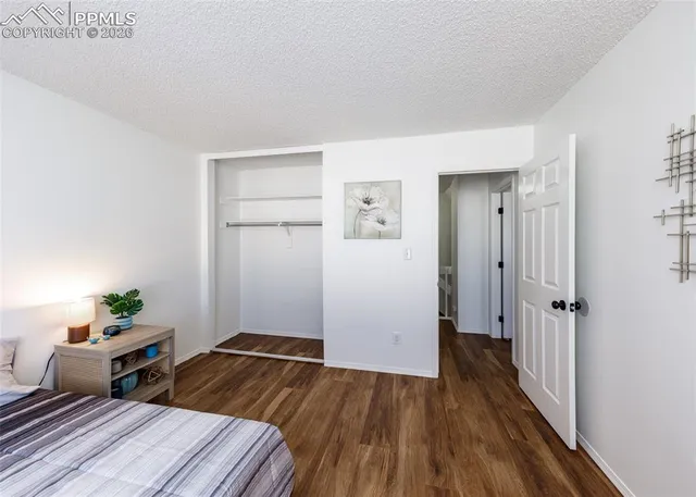 a workspace with furniture and wooden floor