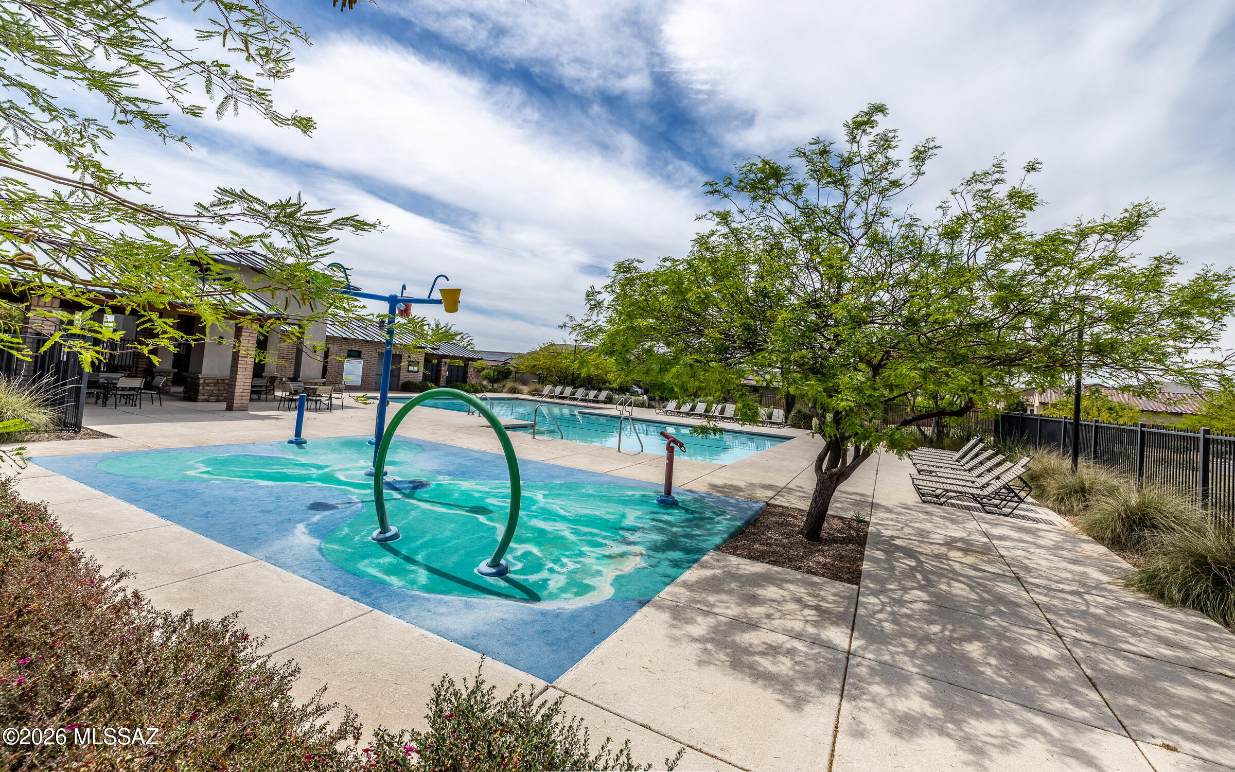 7556 South Circulo Rio Blanco Tucson, AZ 85756 - Photo 44 of 50 Fun community splash pad with water features and shallow play area, right next to the main pool, refreshing water play in the heart of La Estancia.