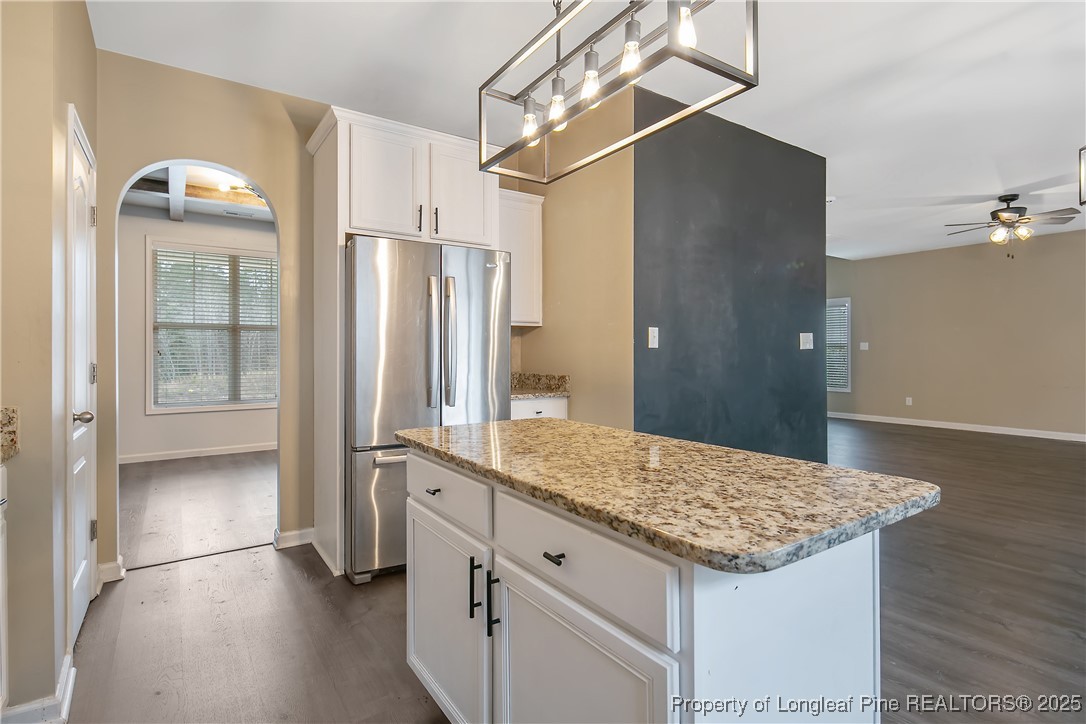 4964 Aberdeen Road Raeford, NC 28376 - Photo 20 of 50 a bathroom with a granite countertop sink and shower