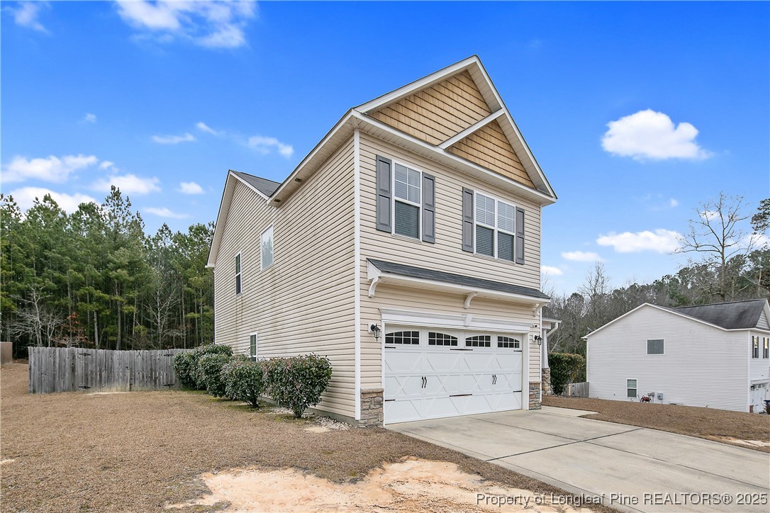 4964 Aberdeen Road Raeford, NC 28376 - Photo 3 of 50 a view of house with backyard