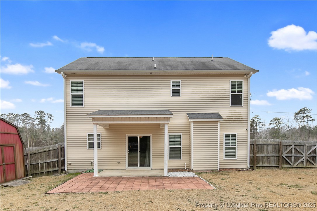 4964 Aberdeen Road Raeford, NC 28376 - Photo 46 of 50 a view of a house with a backyard