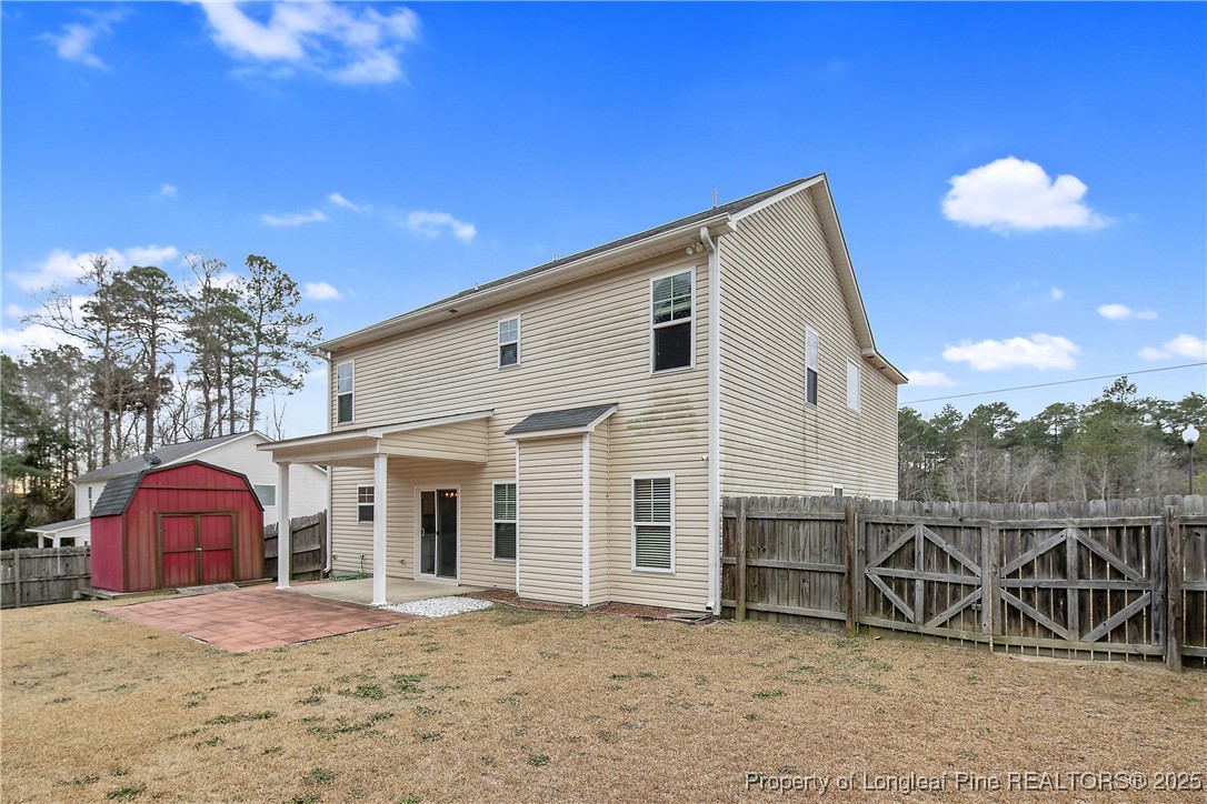 4964 Aberdeen Road Raeford, NC 28376 - Photo 47 of 50 a view of a house with a patio
