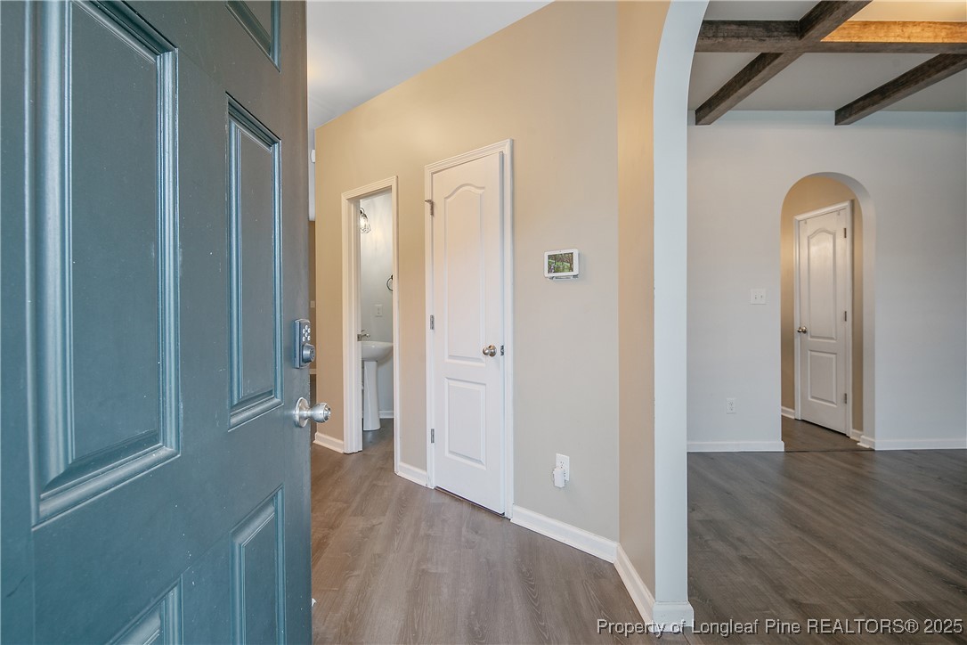 4964 Aberdeen Road Raeford, NC 28376 - Photo 5 of 50 a view of empty room with wooden floor