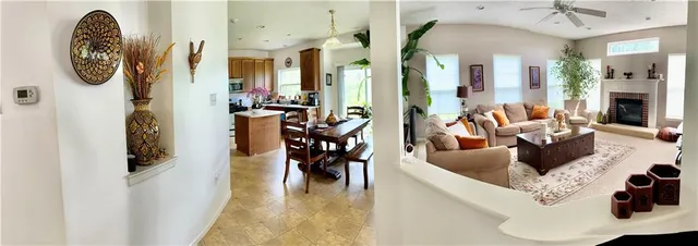 a living room with furniture bathtub and a chandelier