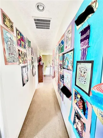 a hallway with toys and furniture
