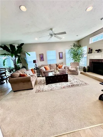 a bedroom with furniture and a chandelier