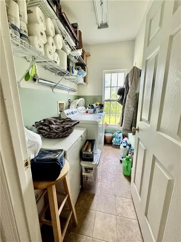 a kitchen with a table and a stove