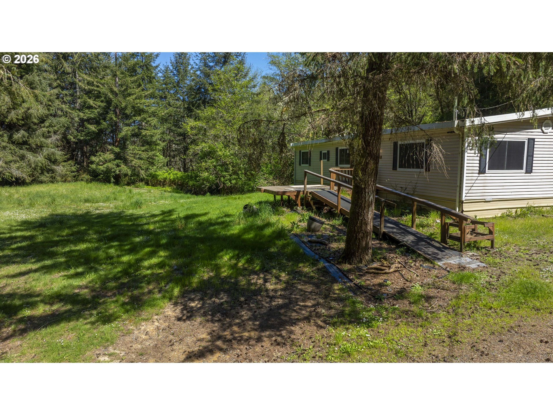 94010 North Way Lane North Bend, OR 97459 - Photo 15 of 21 a black and white photo of a house