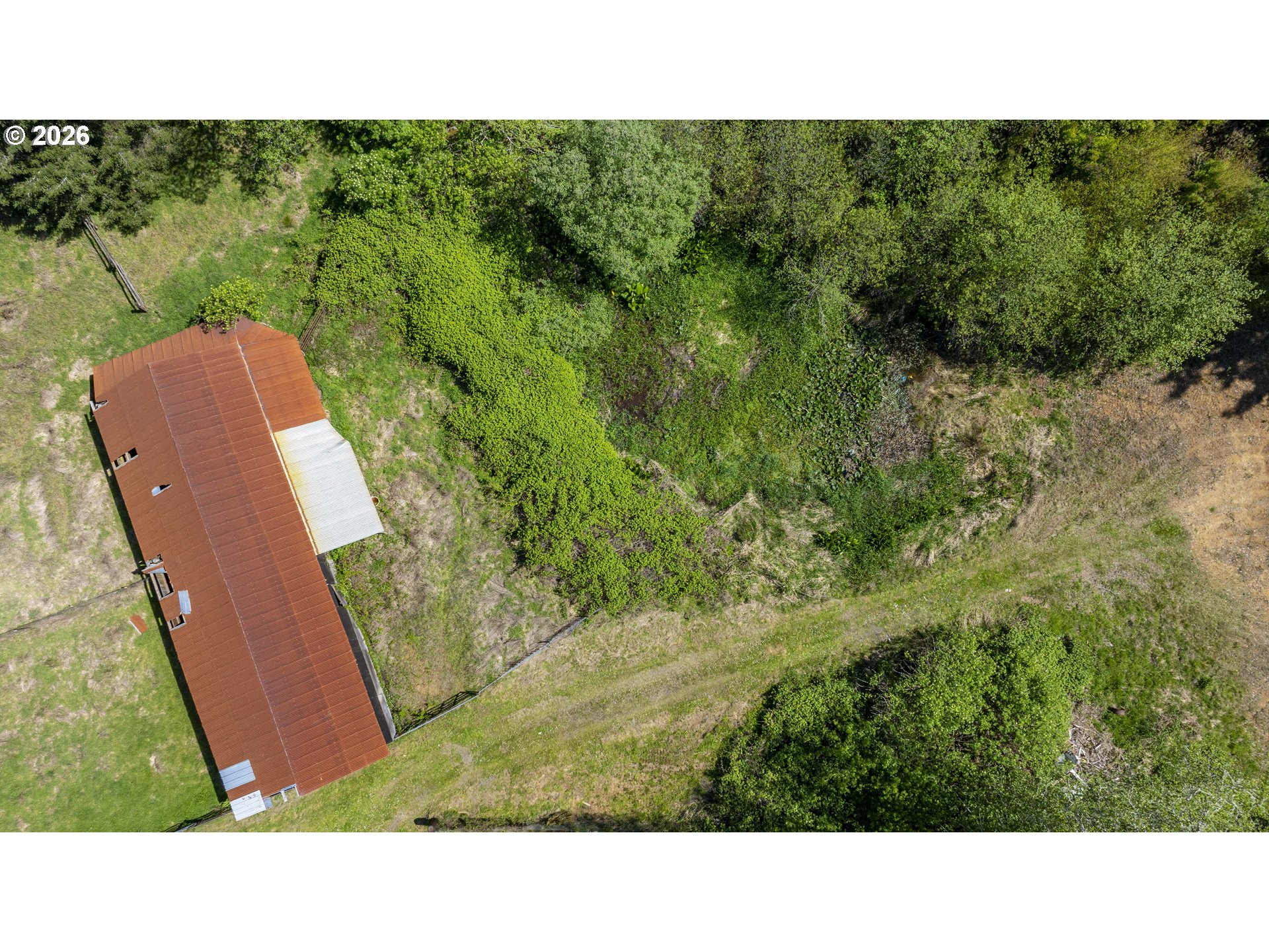 94010 North Way Lane North Bend, OR 97459 - Photo 16 of 21 a open area with trees in the background
