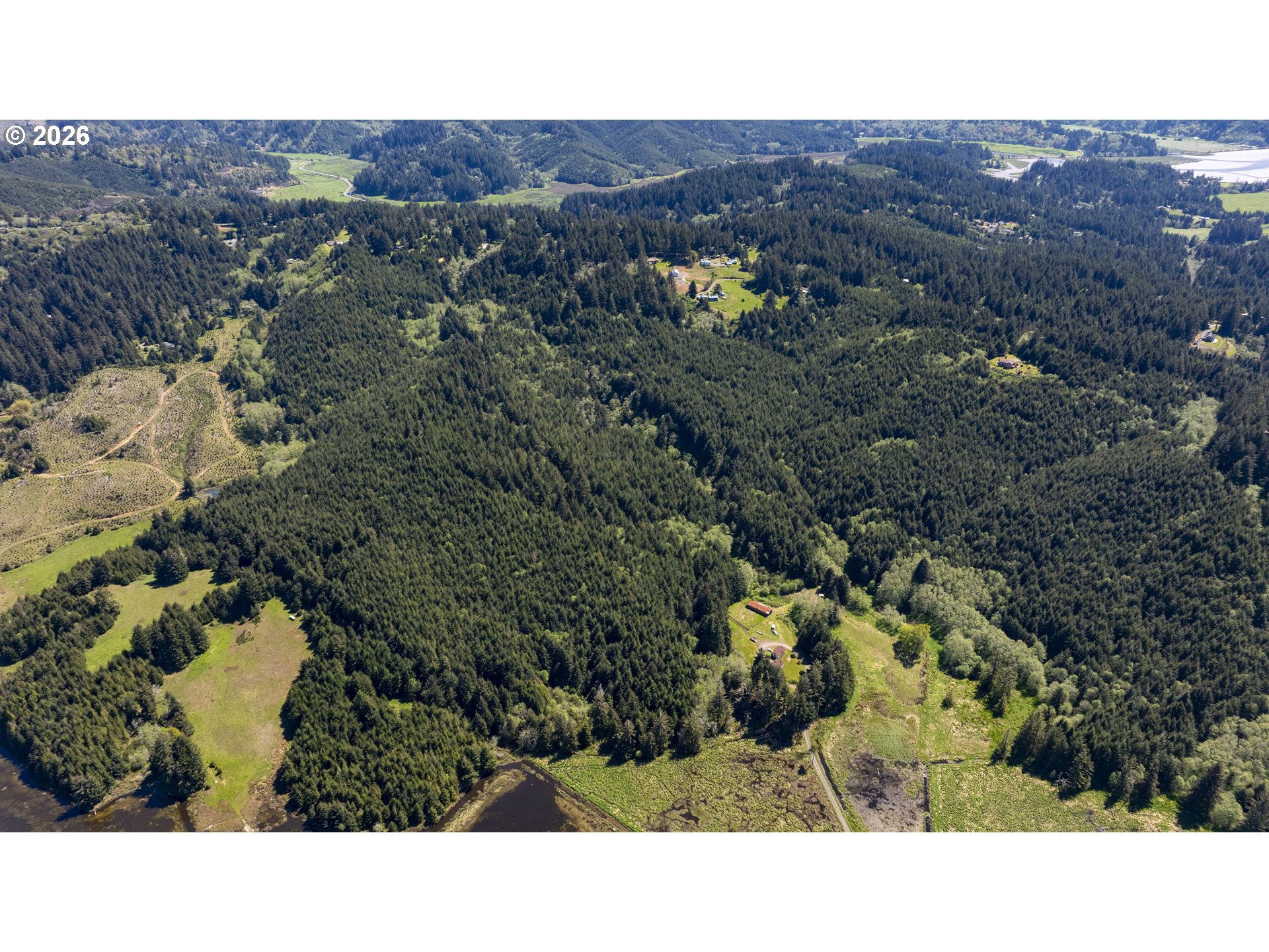 94010 North Way Lane North Bend, OR 97459 - Photo 6 of 21 a black and white photo of a house