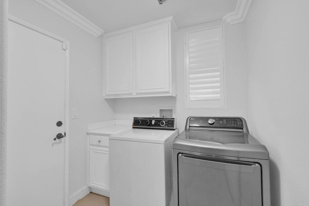 8359 Clover Creek Road Riverside, CA 92508 - Photo 20 of 42 a utility room with dryer and washer
