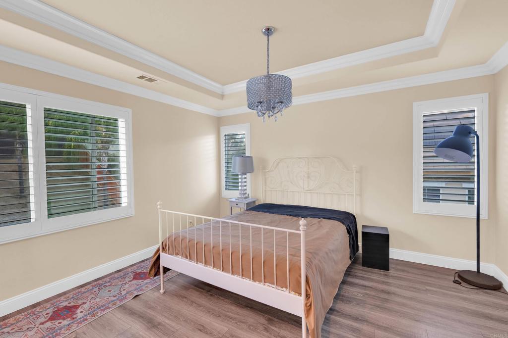 8359 Clover Creek Road Riverside, CA 92508 - Photo 21 of 42 a bed room with a bed and a window