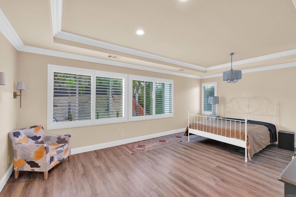 8359 Clover Creek Road Riverside, CA 92508 - Photo 22 of 42 a bedroom with furniture and a window