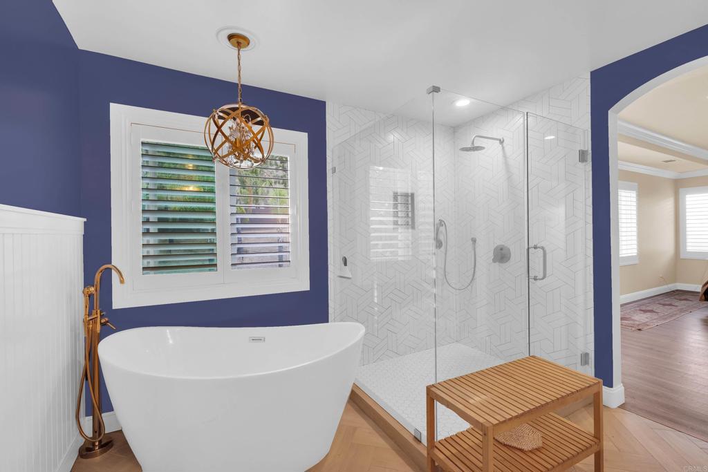 8359 Clover Creek Road Riverside, CA 92508 - Photo 25 of 42 a spacious bathroom with a bathtub and shower