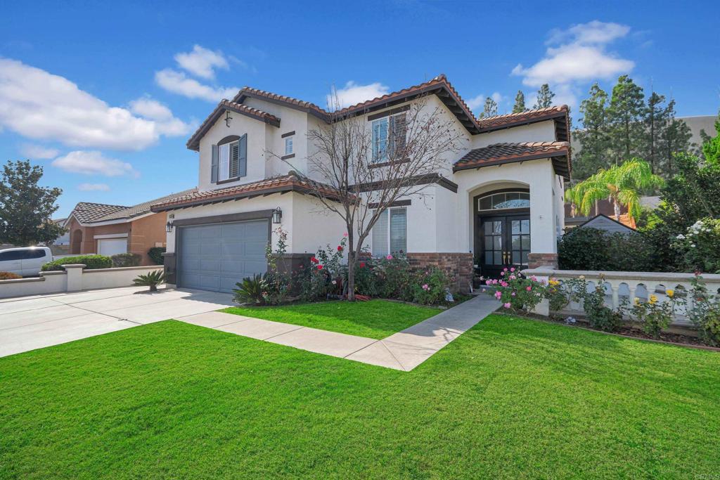 8359 Clover Creek Road Riverside, CA 92508 - Photo 42 of 42 a front view of house with yard and green space
