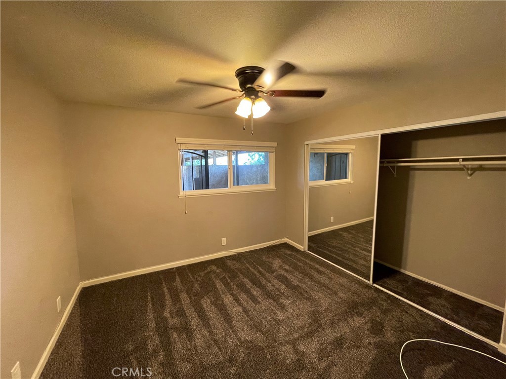 979 West Pine Street Upland, CA 91786 - Photo 13 of 18 a view of room with a ceiling fan
