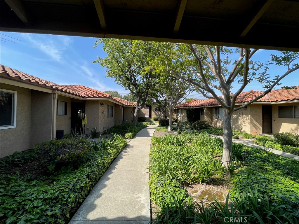 979 West Pine Street Upland, CA 91786 - Photo 2 of 18 a front view of a house with a yard