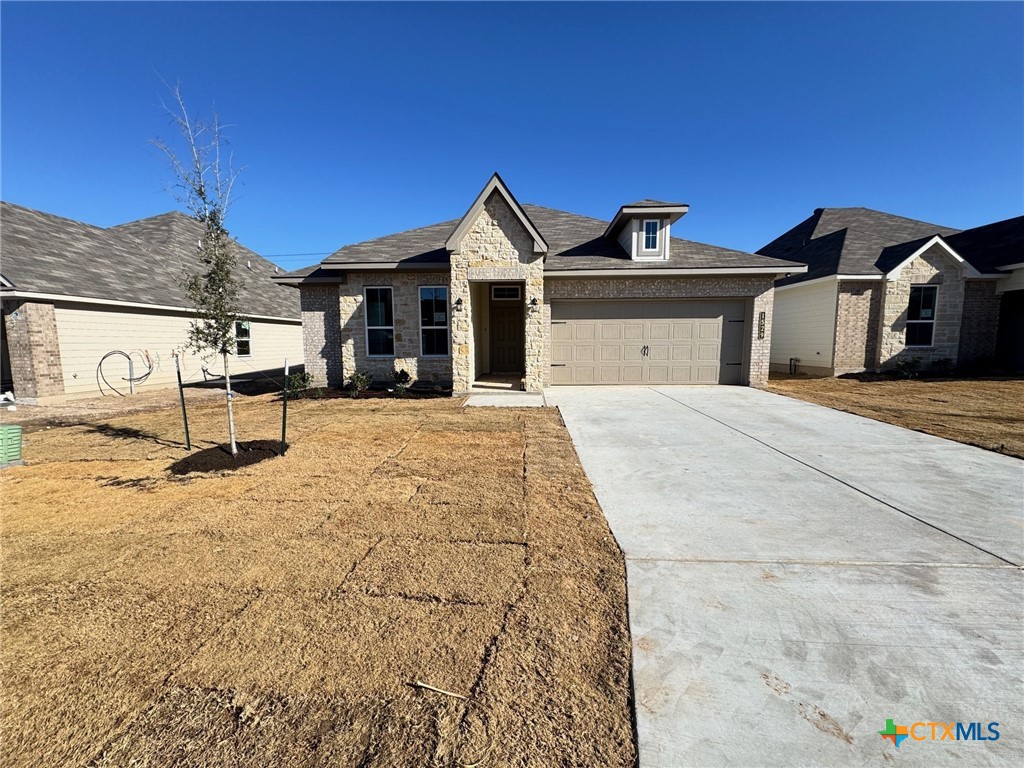 1529 Hillside Drive Temple, TX 76502 - Photo 2 of 19 a front view of a house with a yard