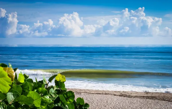 a view of a balcony with an ocean view