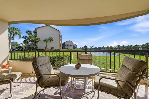 a view of a lake with a big yard