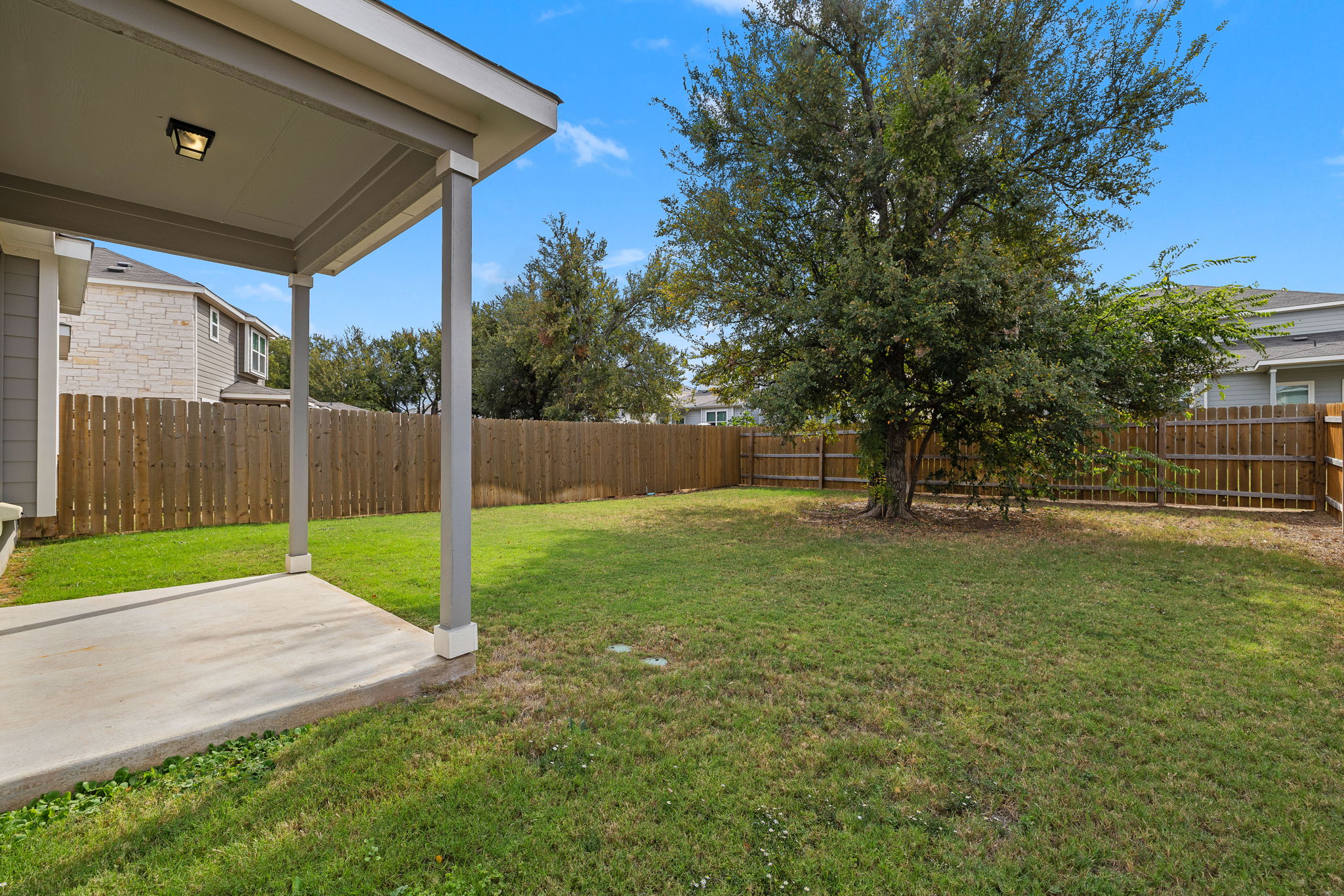 2233 Calvert Drive Leander, TX 78641 - Photo 28 of 32 The backyard hosts a covered patio.