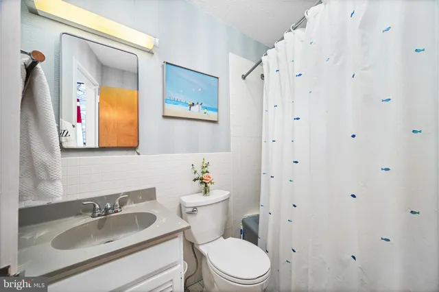 a bedroom with a bed and furniture