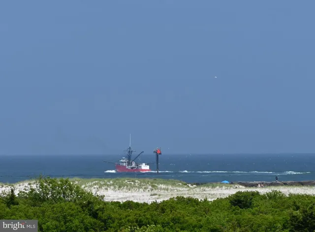 a living room with furniture or couch and a window