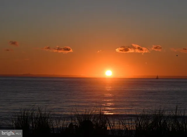 a room with painting and a table
