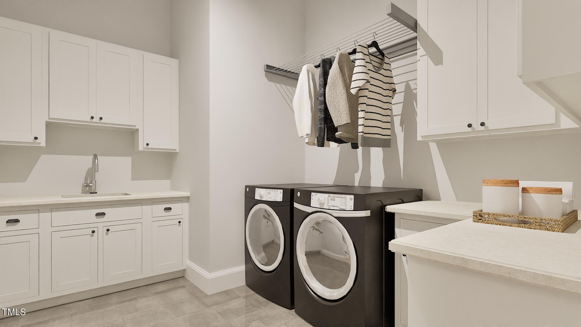 429 Shinleaf Pond Trail Raleigh, NC 27614 - Photo 24 of 31 a utility room with dryer and washer