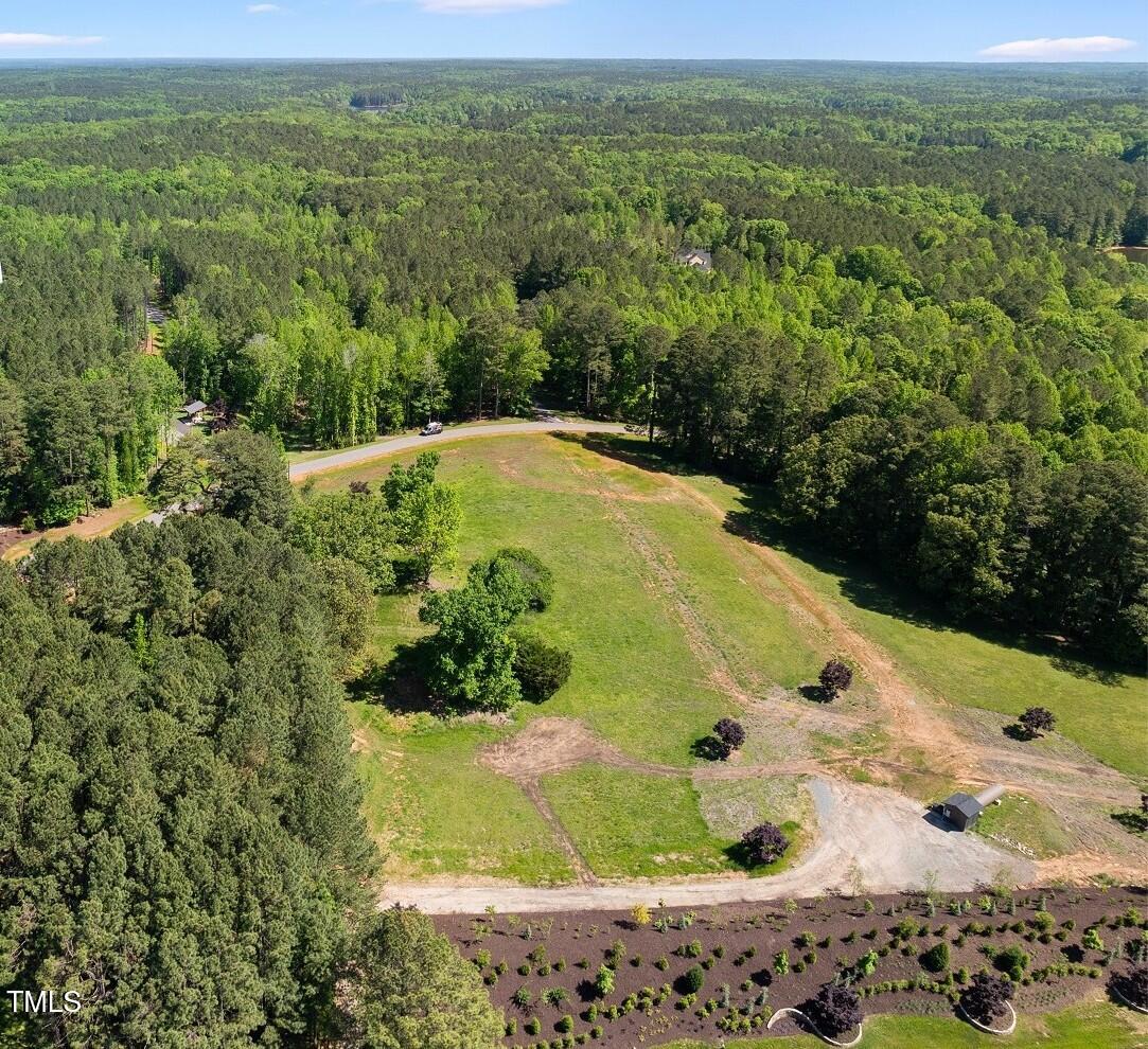 429 Shinleaf Pond Trail Raleigh, NC 27614 - Photo 30 of 31 a view of a garden with a yard