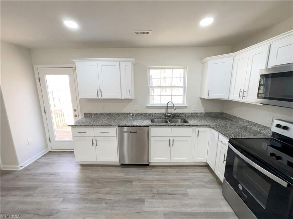 4694 Coltsfoot Road Greensboro, NC 27455 - Photo 2 of 22