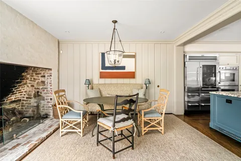 a view of livingroom with furniture window and wooden floor