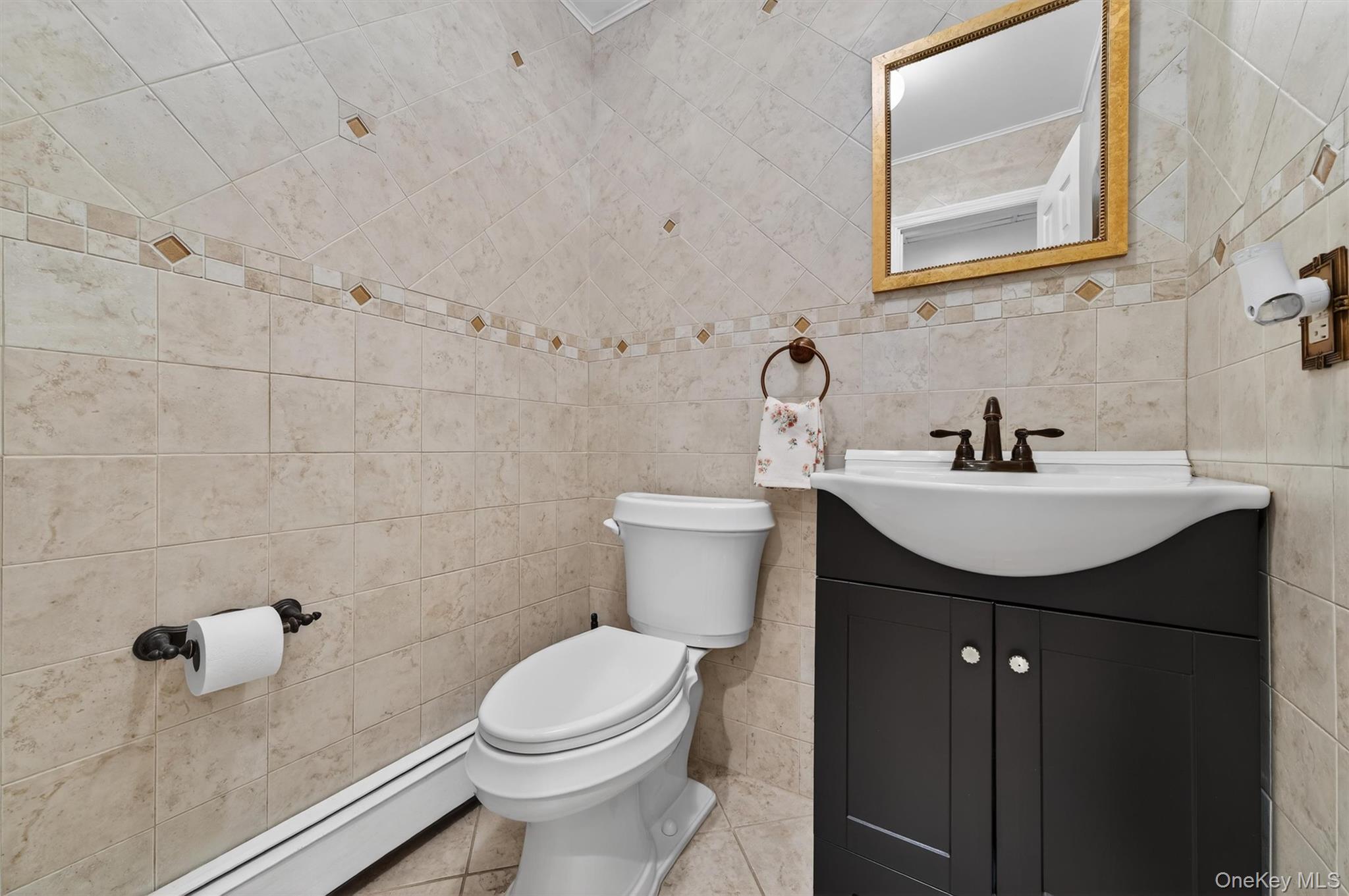 449 West Mombasha Road Monroe, NY 10950 - Photo 17 of 39 a bathroom with a sink toilet and mirror