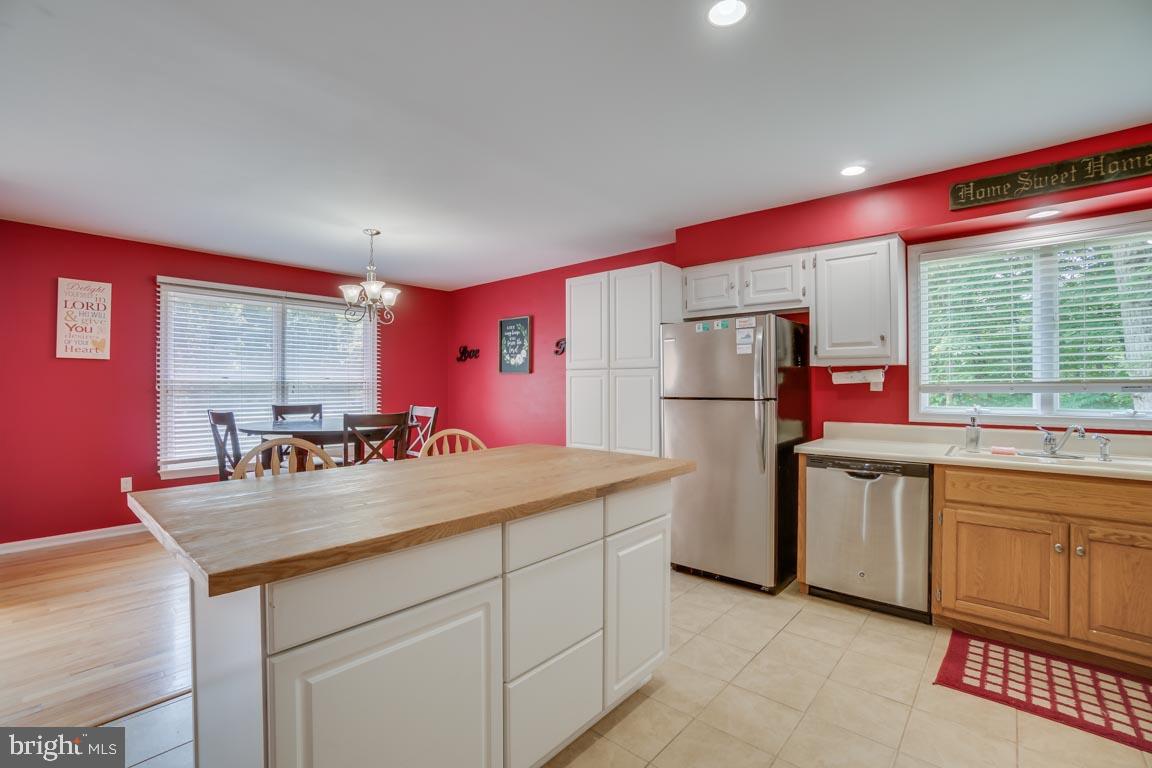 27390 Big H Ranch Road Culpeper, VA 22701 - Photo 12 of 33 Center island with cabinets below