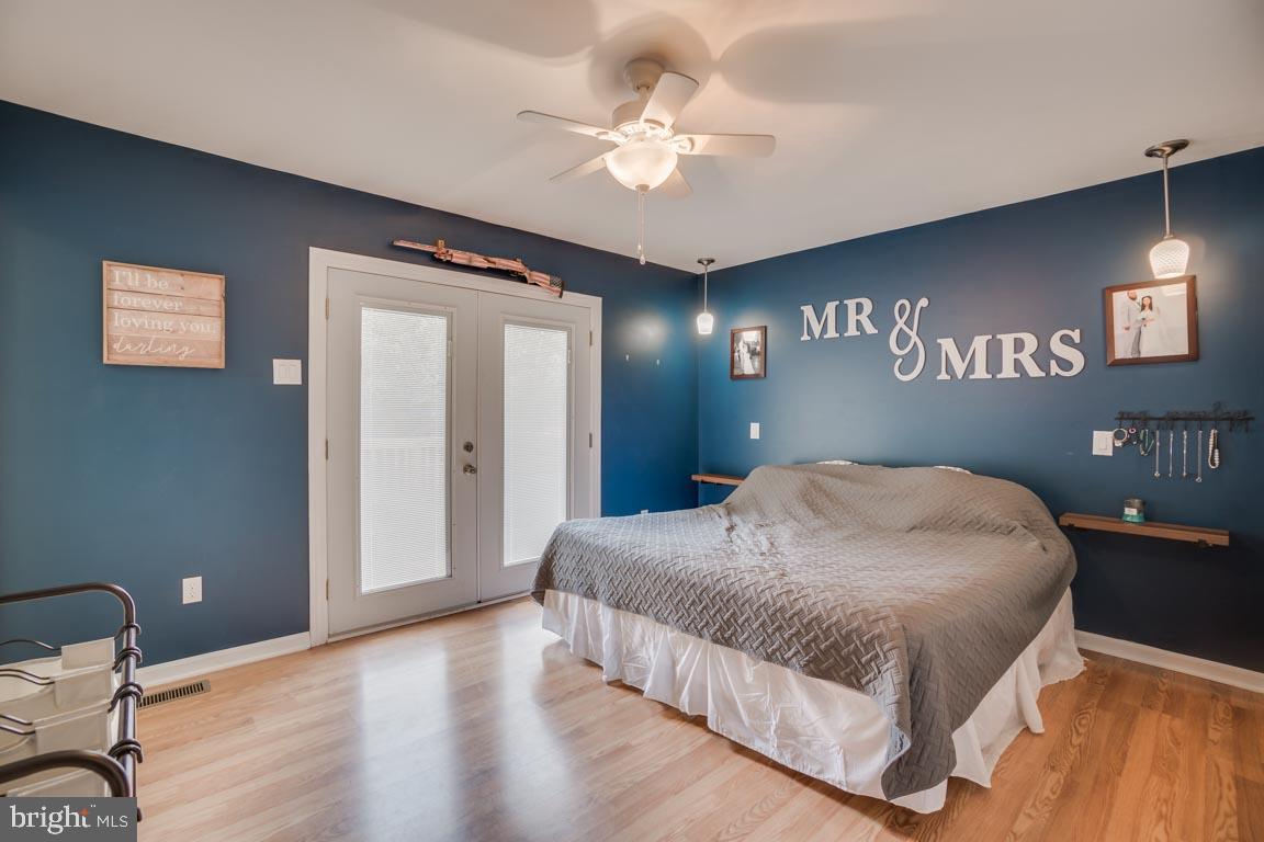 27390 Big H Ranch Road Culpeper, VA 22701 - Photo 16 of 33 Master suite with atrium doors to the deck!!!
