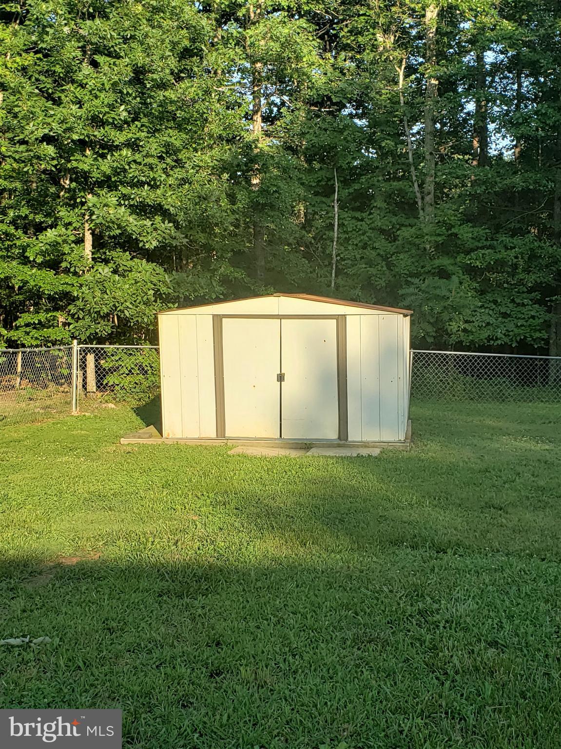 27390 Big H Ranch Road Culpeper, VA 22701 - Photo 30 of 33 Metal shed & shed in front conveys