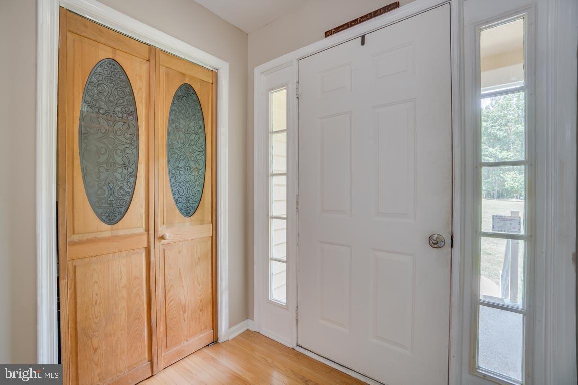 27390 Big H Ranch Road Culpeper, VA 22701 - Photo 6 of 33 Front entrance foyer, cute coat closet doors