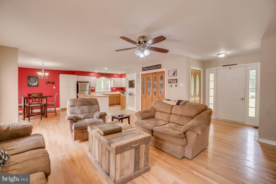 27390 Big H Ranch Road Culpeper, VA 22701 - Photo 7 of 33 Living area boasts natural hardwood flooring!