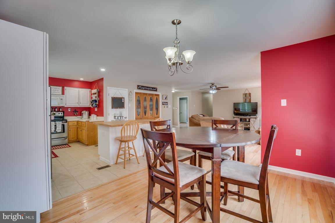 27390 Big H Ranch Road Culpeper, VA 22701 - Photo 8 of 33 Dining room looking to kitchen Hardwood floors!