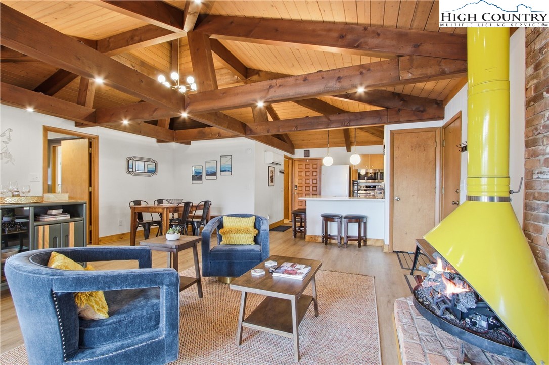 154 Lady Slipper Loop Newland, NC 28657 - Photo 14 of 50 a outdoor space with lots of furniture and a couch