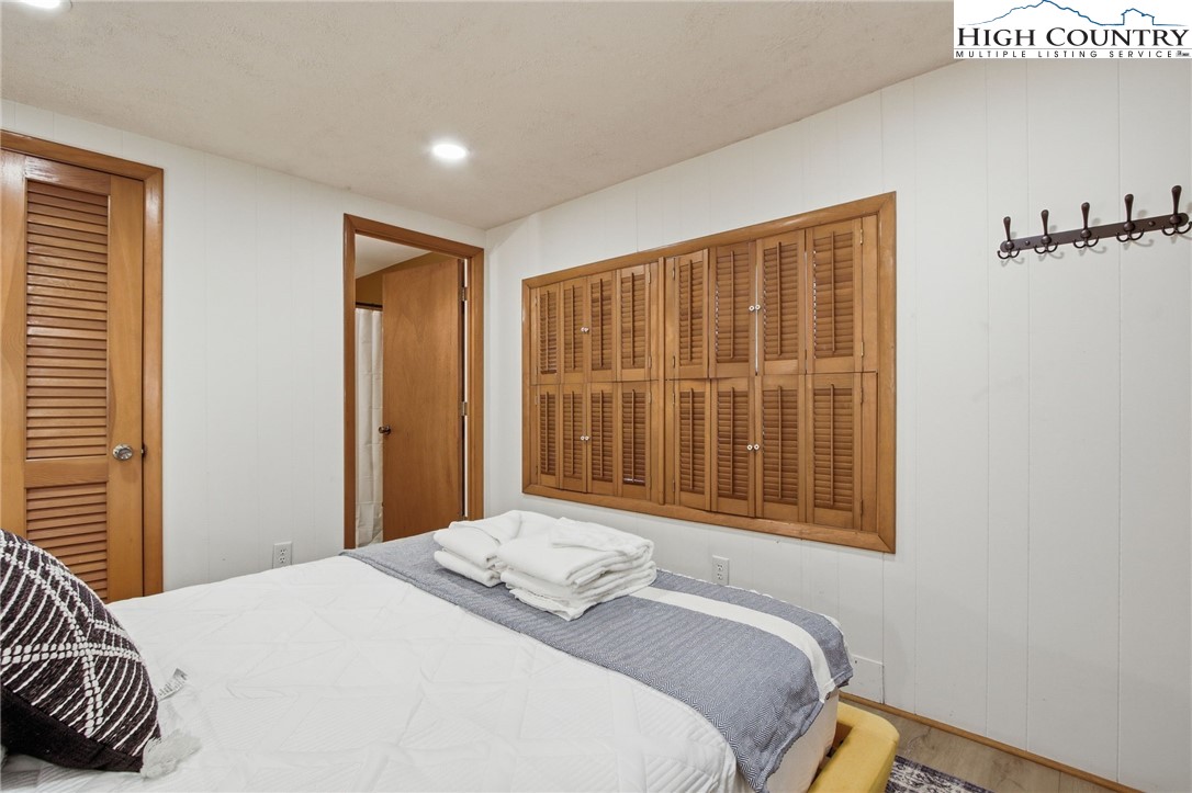 154 Lady Slipper Loop Newland, NC 28657 - Photo 21 of 50 a bedroom with a bed and a window