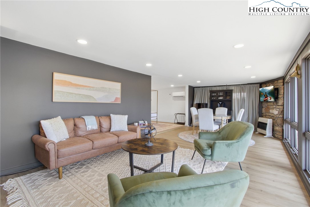 154 Lady Slipper Loop Newland, NC 28657 - Photo 30 of 50 a living room with furniture and a table