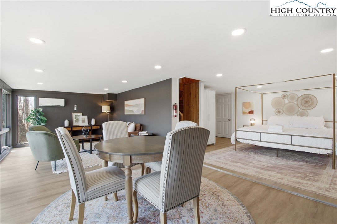 154 Lady Slipper Loop Newland, NC 28657 - Photo 33 of 50 a view of a dining room with furniture and window