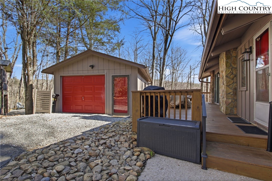 154 Lady Slipper Loop Newland, NC 28657 - Photo 41 of 50 a front view of a house with a yard