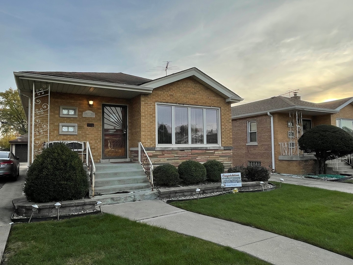 3119 West 84th Place Chicago, IL 60652 - Photo 1 of 4 a front view of a house with a yard